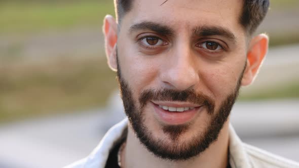 Portrait of Caucasian Bearded Man Face with White Skin Smile Look at Camera Open and Confident alt
