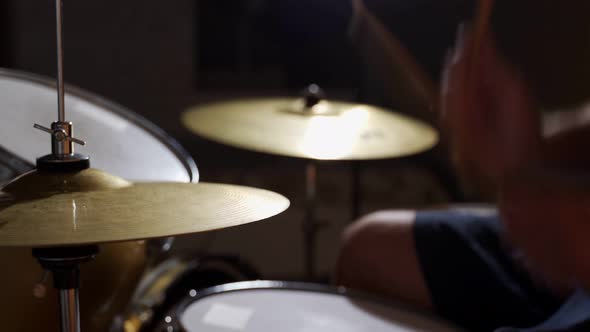Closeup Drummer Rehearsing on Drums Before Rock Concert alt