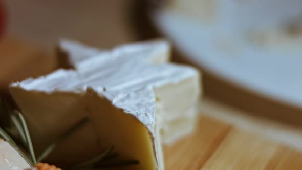 Soft Cheese Brie on a Wooden Cutting Board alt