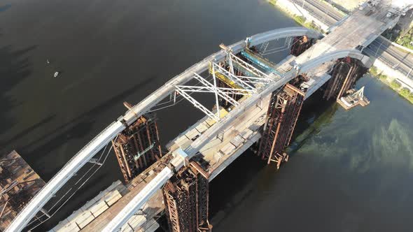 Aerial View of the Unfinished PodolskoVoskresensky Bridge Across the Dnieper River in Kiev Ukraine
