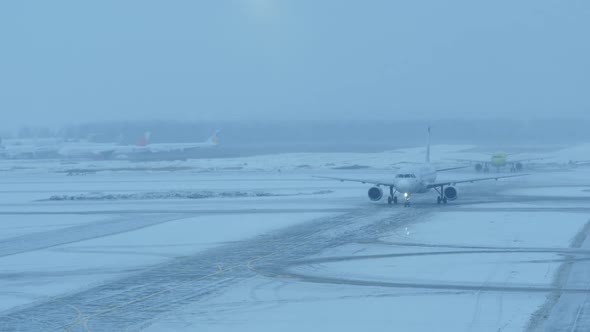Aircraft Entering the Airport During Winter