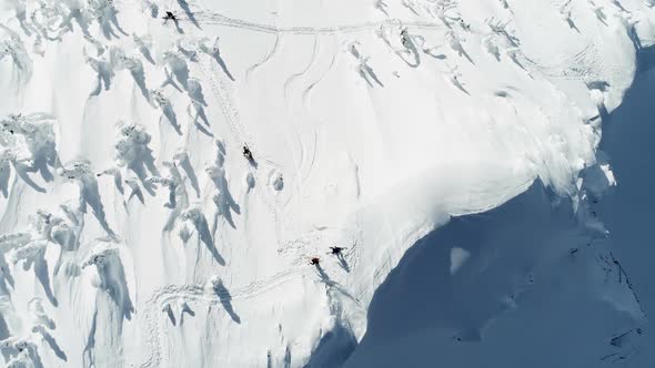 Skier skiing on a snow capped mountain 4k alt