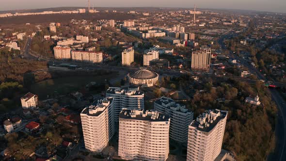 Establishing Orbiting Aerial Shot of Chisinau Moldova at Sunset alt