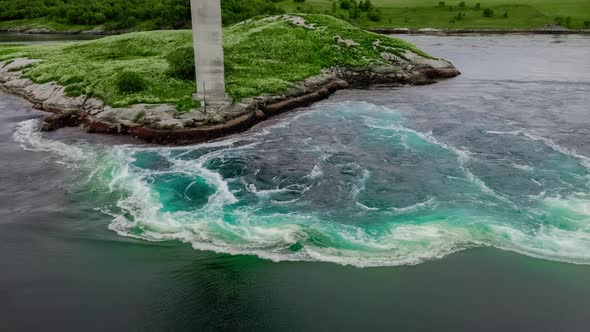Waves of Water of the River and the Sea Meet Each Other During High Tide and Low Tide alt