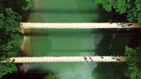 Aerial view of Sipatan Twin Hanging Bridge, Loboc, Philippines. alt