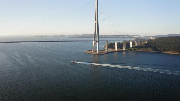 Aerial View of the Russian Bridge Over Which the Coast Guard Ship Passes alt