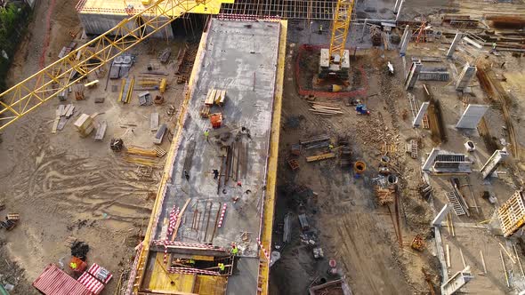 Workers On The Building Construction alt