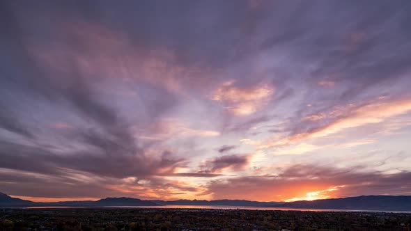 Colorful timelapse over Orem and Provo in Utah Valley at sunset alt