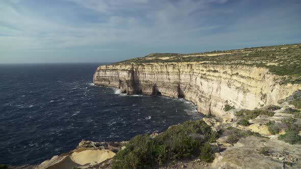 Dark Blue Mediterranean Sea Waters Washes Shores of Island Gozo in Malta