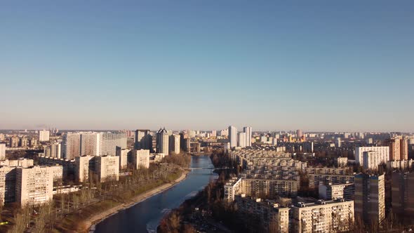 Left bank of the city of Kiev. Rusanovsky district. winter, sunset. aerial view alt