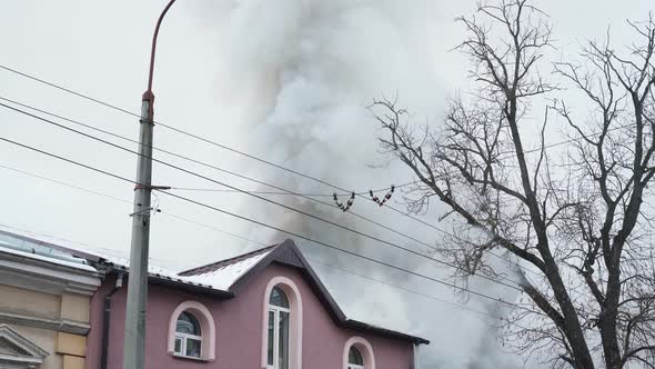 Dark Smoke and Flame Near Residential House alt