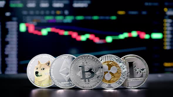 Coin Bitcoin, Ethereum, Litecoin, Shiba and Ripple on background cryptocurrency trading chart alt