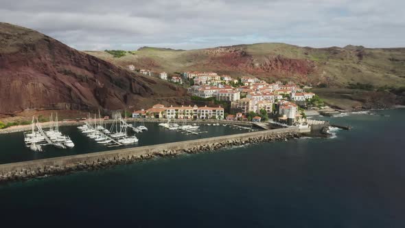 Drone Footage of a Charming Bay with White Yachts By the Shoreline alt