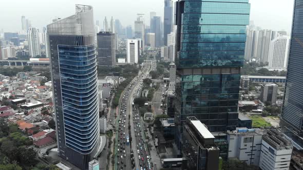 Cinematic citycape aerial view, overhead view of buildings and skyscrapers in a city.