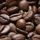 Brown roasted coffee beans close up full frame as a background - VideoHive Item for Sale