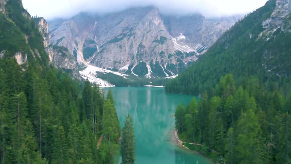 Beautiful Landscape of Braies Lake Lago Di Braies Romantic Place with Wooden Bridge and Boats on the alt
