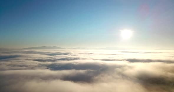 Aerial Shot of Majestic Sunrise in the Mountains alt