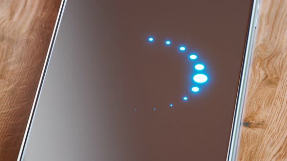 A smartphone displaying the sync icon. Synchronizing in progress. Sync data. alt