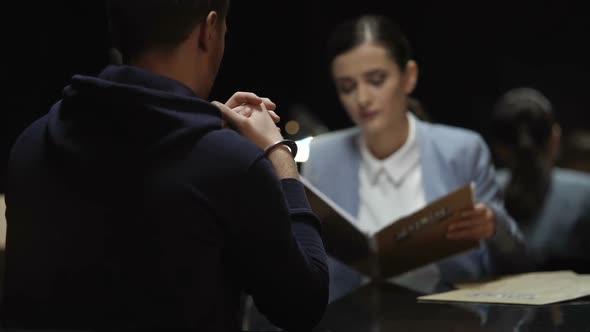 Thinking Woman Prosecutor Reading Criminal Case Documents, Interrogation Process alt