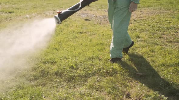 Professional Sanitation Service Look at Tablet and Discuss Which Territory Should Be Cleaned and alt