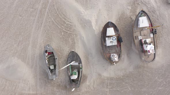 Old Fishing Boats Ashore on Thorup Strand Beach in Denmark alt