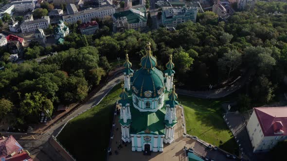 Aerial View of St. Andrews Church, Orthodox Church on Green Hill in the City alt