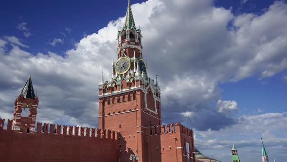 Moscow Kremlin, Russia, Spasskaya Tower against the moving clouds, UNESCO World Heritage Site 