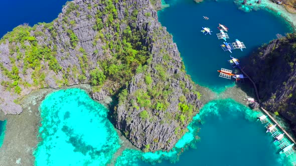 Coron, Palawan, Philippines, Aerial View of Beautiful Lagoons and Limestone Cliffs alt