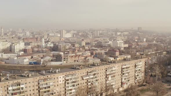 Flying Over the Roof of One of the Houses of the City of Kharkov, on Which a Couple Man and Woman alt