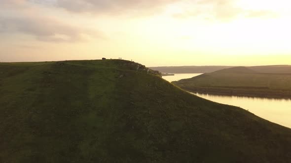 Aerial view of wide Dnister river and distant rocky hills in Bakota area, part of the National park  alt