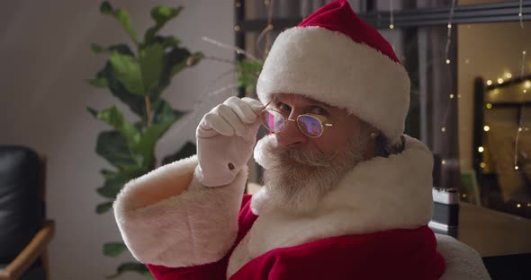 Handsome Charming Mature Caucasian Man with a Gray Beard Dressed in Santa Claus Christmas Carnival alt