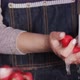 A Woman Washes Radishes Under a Stream of Water From a Kitchen Tap - VideoHive Item for Sale