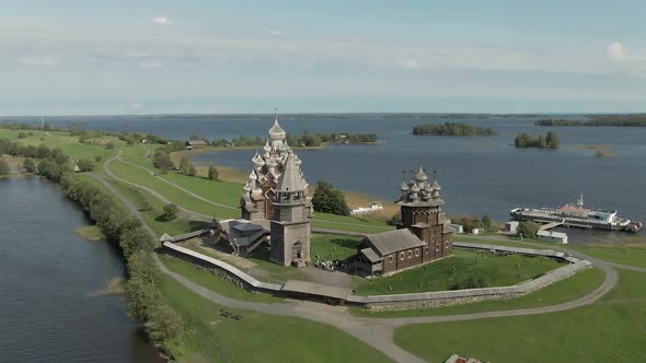 a Cinematic Shot From the Air Around the Wooden Walkway of Kizhi alt