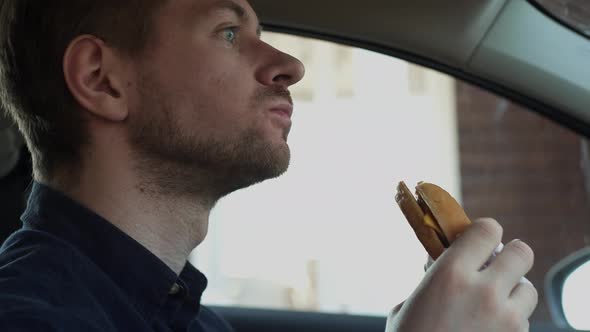 The Guy in the Car Eats Fasfood