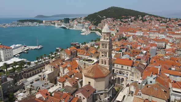 A an aerial picture of Split city centre showing Diocletian's Palace, the bell tower of the cathedra alt