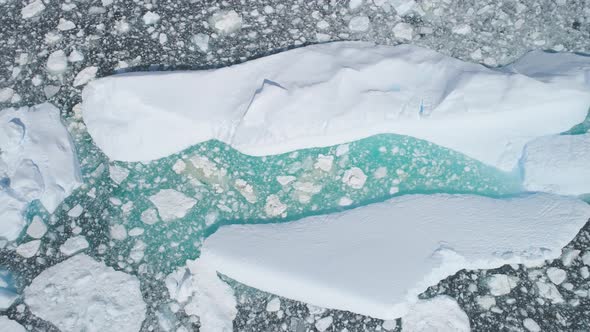 Turquoise Iceberg Brash Ice Aerial Top Down View alt