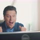 Pleasant Surprise of a Man at a Computer - VideoHive Item for Sale