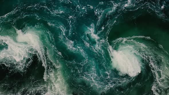 Waves of Water of the River and the Sea Meet Each Other During High Tide and Low Tide alt