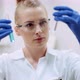 Female Scientist Looking for a Cure for Coronavirus - VideoHive Item for Sale