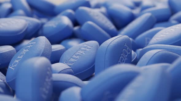A giant pile of countless blue pills. Endless, seamless looping animation. 4KHD