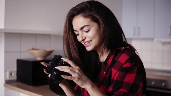 Closeup Footage of a Young Brunette Girl Looking Into the Camera and Laughing alt