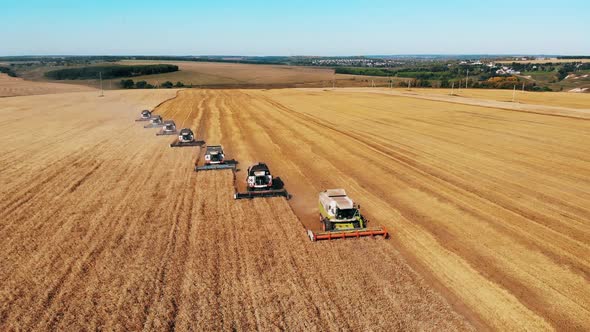 Plowing Combine Machines Work on a Farm. Crop Harvesting Concept. alt