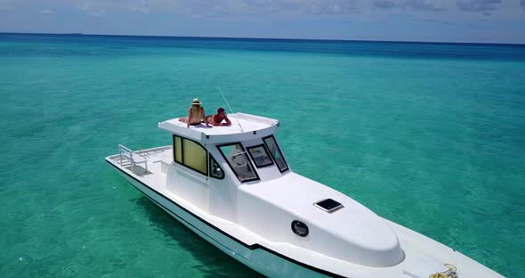 Beautiful people on romantic honeymoon enjoy life on beach on sunny white sandy background 4K alt