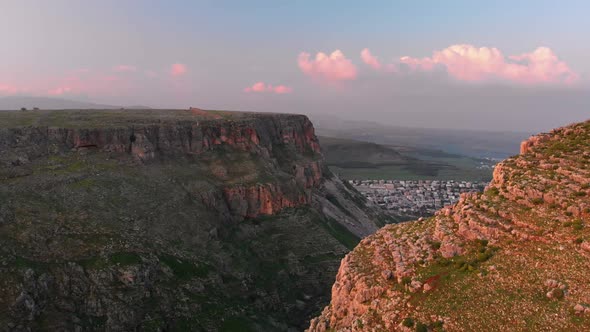 Aerial footage of the Mount Arbel near the Sea of Galilee in Israel alt