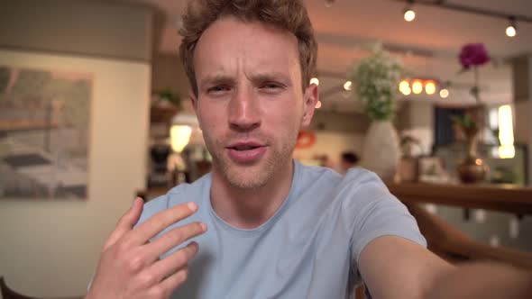 Nice man introduced himself, told something to the camera, he was holding a camera alt