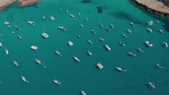 Aerial View of Many Yachts in a Bay on Formentera Island alt