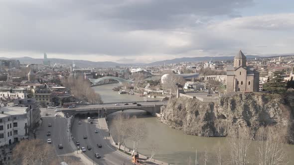 Aerial view of Metekhi church in old Tbilisi located on cliff near river Kura. Georgia 2021 Spring alt