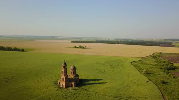 Abandoned Red Brick Church In Countryside