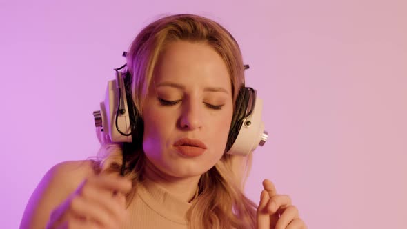 Female Dancer Posing Against Colourful Background alt