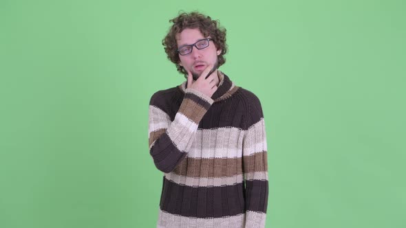 Stressed Young Bearded Man Showing Face Palm alt